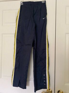 Nike Navy Track Pants with Yellow & White Side Stripes